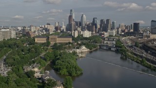 AX79_066E - 4.8K aerial stock footage of Philadelphia Museum of Art and Downtown Philadelphia skyline seen from the Schuylkill River, Pennsylvania