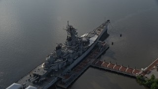 4.8K aerial stock footage approaching and flying over USS New Jersey on Delaware River, Camden, New Jersey Aerial Stock Footage | AX79_093