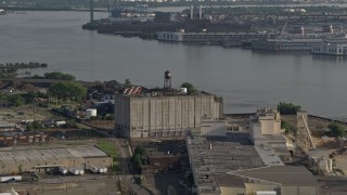 4.8K aerial stock footage of a factory building beside the Delaware River, Camden, New Jersey Aerial Stock Footage | AX79_095