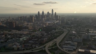 4.8K aerial stock footage of I-676 to Downtown Philadelphia skyline, Pennsylvania, Sunset Aerial Stock Footage | AX80_004