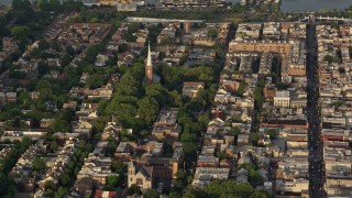 4.8K aerial stock footage of St Peter's Episcopal Church in an urban neighborhood, Philadelphia, Philadelphia, Sunset Aerial Stock Footage | AX80_020