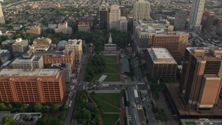 AX80_025E - 4.8K aerial stock footage approaching Independence National Historic Park and Mall near Philadelphia Mint, Philadelphia, Pennsylvania, Sunset