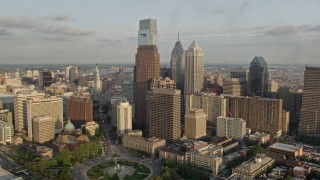 4.8K aerial stock footage of Comcast Center, BNY Mellon Center, and Three Logan Square in Downtown Philadelphia, Pennsylvania, Sunset Aerial Stock Footage | AX80_046