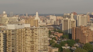 4.8K aerial stock footage of office and apartment buildings around Inquirer Building in Downtown Philadelphia, Pennsylvania, Sunset Aerial Stock Footage | AX80_067