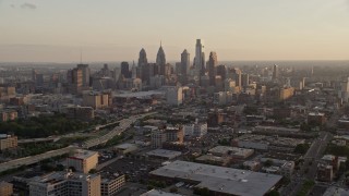 4.8K aerial stock footage of Downtown Philadelphia skyline and the I-676 freeway, Pennsylvania, at sunset Aerial Stock Footage | AX80_097E