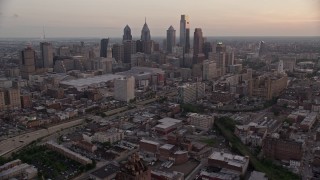 4.8K aerial stock footage of Downtown Philadelphia skyline, Pennsylvania Convention Center, and I-676, Pennsylvania, Sunset Aerial Stock Footage | AX80_155