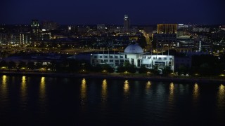 AX81_002 - 4.8K aerial stock footage of Adventure Aquarium by the Delaware River, Camden, New Jersey, Night