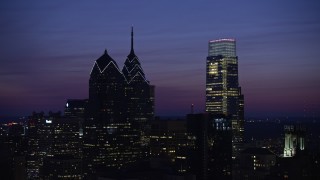 4.8K aerial stock footage of One and Two Liberty Place, Comcast Center, Downtown Philadelphia, Pennsylvania, Night Aerial Stock Footage | AX81_016