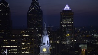 4.8K aerial stock footage of the William Penn statue on top of Philadelphia City Hall, Pennsylvania, Night Aerial Stock Footage | AX81_020