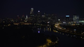 4.8K aerial stock footage of Philadelphia Museum of Art, Schuylkill River and the Downtown Philadelphia skyline, Pennsylvania, Night Aerial Stock Footage | AX81_027