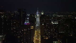 4.8K aerial stock footage following Broad Street to approach Philadelphia City Hall, Downtown Philadelphia, Pennsylvania, Night Aerial Stock Footage | AX81_046