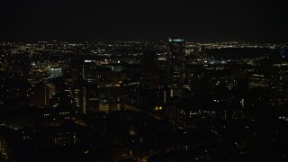 4.8K aerial stock footage flying by Downtown Philadelphia apartment and office buildings, Pennsylvania, Night Aerial Stock Footage | AX81_081