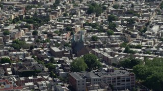 4.8K aerial stock footage of St. Laurentius Parish church in an urban neighborhood, North Philadelphia, Pennsylvania Aerial Stock Footage | AX82_026