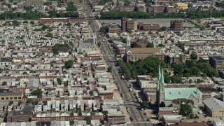 4.8K aerial stock footage of churches in a urban neighborhood, North Philadelphia, Pennsylvania Aerial Stock Footage | AX82_028E