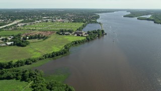 AX82_036 - 4.8K aerial stock footage of Philadelphia Fire Academy by the Delaware River, Philadelphia, Pennsylvania