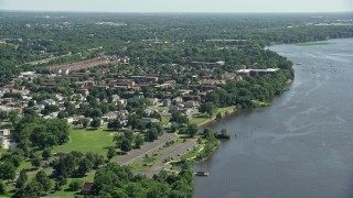 4.8K aerial stock footage of apartment buildings and homes beside the Delaware River, Philadelphia, Pennsylvania Aerial Stock Footage | AX82_037