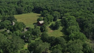 4.8K aerial stock footage of a barn on a small farm in Bensalem, Pennsylvania Aerial Stock Footage | AX82_041