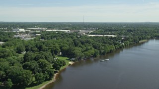 4.8K aerial stock footage of warehouse buildings by the Delaware River, Bensalem, Pennsylvania Aerial Stock Footage | AX82_043