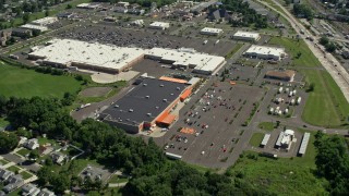 AX82_053 - 4.8K aerial stock footage flying over Levittown Town Center and a small fair in Levitown, Pennsylvania