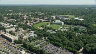 AX82_092 - 4.8K aerial stock footage of Roberts Stadium and sports fields on the Princeton University campus, New Jersey