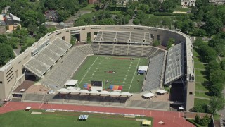 4.8K aerial stock footage of football practice at Princeton University Stadium, New Jersey Aerial Stock Footage | AX82_102