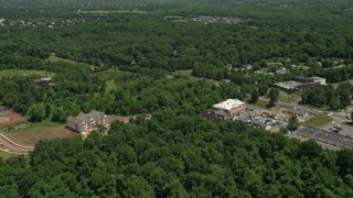 AX83_002 - 4.8K aerial stock footage flying over strip mall and small office park in Skillman, New Jersey