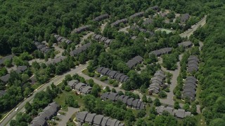 4.8K aerial stock footage of condominium complex surrounded by forests, Skillman, New Jersey Aerial Stock Footage | AX83_011