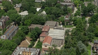 4.8K aerial stock footage tilting from Princeton University Art Museum to reveal campus buildings and the Chapel, New Jersey Aerial Stock Footage | AX83_028