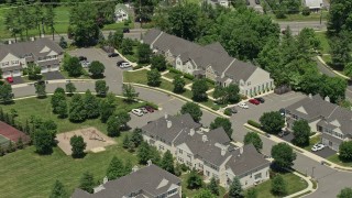 AX83_030E - 4.8K aerial stock footage flying over and tilting to town houses in Princeton, New Jersey