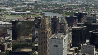 AX83_089E - 4.8K aerial stock footage of flags atop skyscrapers in Downtown Newark, New Jersey