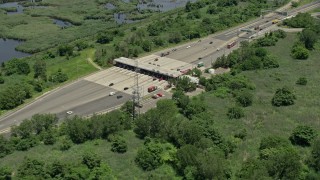 AX83_100 - 4.8K aerial stock footage of a toll booth on Interstate 280 in Kearny, New Jersey