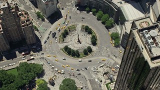 AX83_141 - 4.8K aerial stock footage tilting to a bird's eye view of Columbus Circle in Midtown Manhattan, New York City