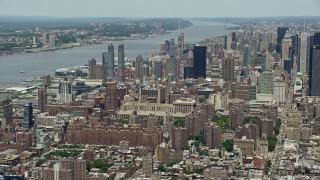 4.8K aerial stock footage of Hell's Kitchen skyscrapers by the Hudson River, Midtown Manhattan, New York City Aerial Stock Footage | AX83_147