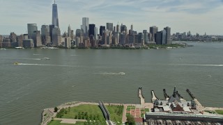 AX83_171 - 4.8K aerial stock footage of Lower Manhattan skyline seen from Liberty State Park, New York City