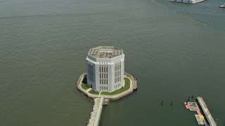 AX83_176 - 4.8K aerial stock footage flying the Brooklyn Tunnel Air Vent, Governors Island, New York City