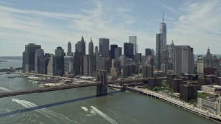 AX83_185 - 4.8K aerial stock footage approaching the Brooklyn Bridge and Lower Manhattan skyline, New York City