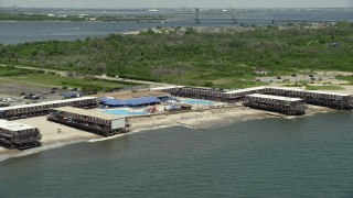 AX83_226 - 4.8K aerial stock footage flying the Silver Gull Beach Club, Breezy Point, Queens, New York