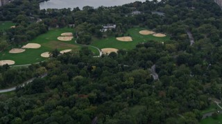 4K aerial stock footage Flying over Central Park, revealing Midtown Manhattan, New York, New York Aerial Stock Footage | AX84_041