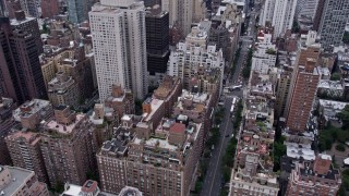 4K Aerial Video of Apartments on bank of East River, reveal Midtown Manhattan, New York, New York Aerial Stock Footage | AX84_143