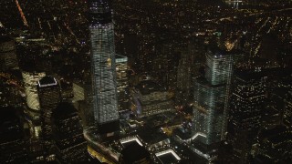 4K aerial stock footage of World Trade Center skyscrapers, Lower Manhattan, New York, New York, night Aerial Stock Footage | AX85_026