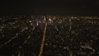 4K aerial stock footage Approaching Midtown Manhattan, New York, New York, night Aerial Stock Footage | AX85_032