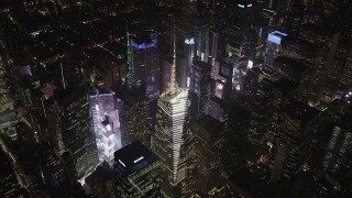 AX85_039 - 4K aerial stock footage Times Square, skyscrapers, Midtown Manhattan, New York, New York, night