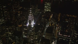 4K aerial stock footage Flying by Chrysler Building, Midtown Manhattan, New York, New York, night Aerial Stock Footage | AX85_071