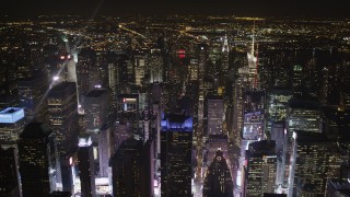 4K aerial stock footage Times Square skyscrapers, Midtown Manhattan, New York, New York, night Aerial Stock Footage | AX85_075