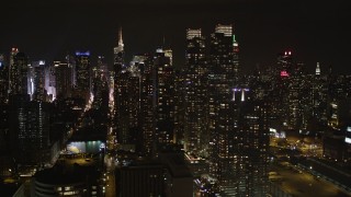 4K aerial stock footage Flying by Midtown Manhattan, seen from Hudson River, New York, New York, night Aerial Stock Footage | AX85_112