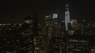 4K aerial stock footage Fly by One World Trade Center, Lower Manhattan, New York, New York, night Aerial Stock Footage | AX85_130