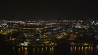 4K aerial stock footage Flying by an oil refinery, Newark Bay, Newark, New Jersey, night Aerial Stock Footage | AX85_144