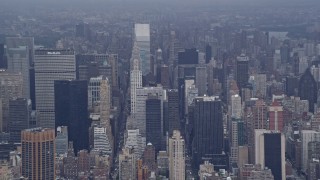 4K aerial stock footage flyby Chrysler Building, reveal Empire State Building and Midtown Manhattan, New York City Aerial Stock Footage | AX86_028