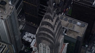 4K aerial stock footage approach top of the Chrysler Building, tilt to bird's eye view, Midtown Manhattan, New York City Aerial Stock Footage | AX86_040