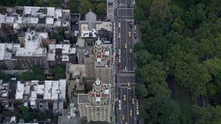 4K aerial stock footage tilt to a bird's eye view of The San Remo apartment building, Upper West Side, New York City Aerial Stock Footage | AX86_053